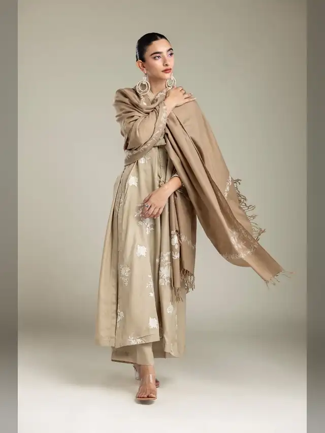Khaadi Festive 2026 beige embroidered raw silk three piece suit