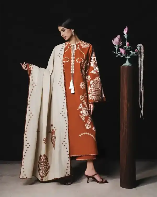 Jugnu Unstitched AW 26 The Reading Room Rust and Ivory