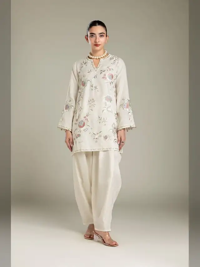 Khaadi Festive 2026 ivory embroidered raw silk three piece suit